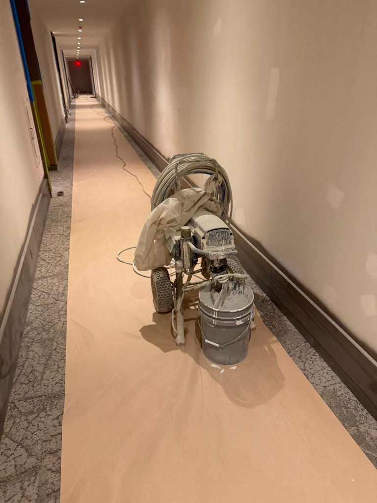 Corridor with floor protection and painting equipment